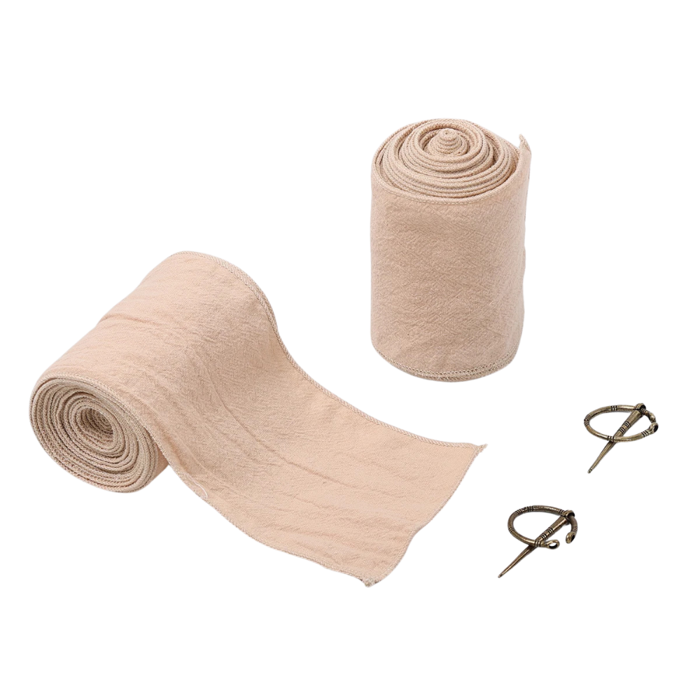 Renporium's Viking Leg Wraps in Beige. These leg wraps pair effortlessly with any medieval trousers to give your Viking look at any Renaissance Fair the perfect touch.