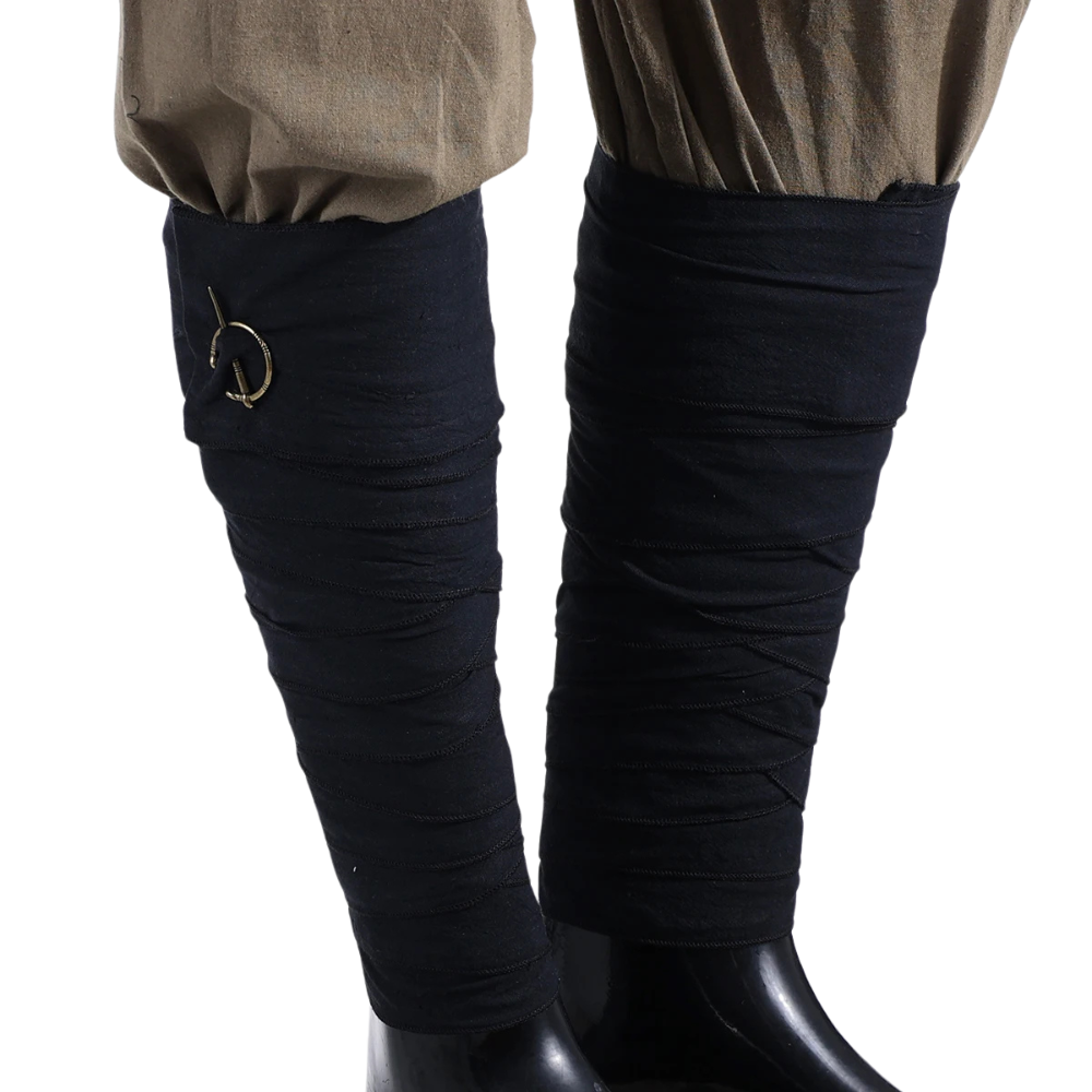 Renporium's Viking Leg Wraps in Black. These leg wraps pair effortlessly with any medieval trousers to give your Viking look at any Renaissance Fair the perfect touch.