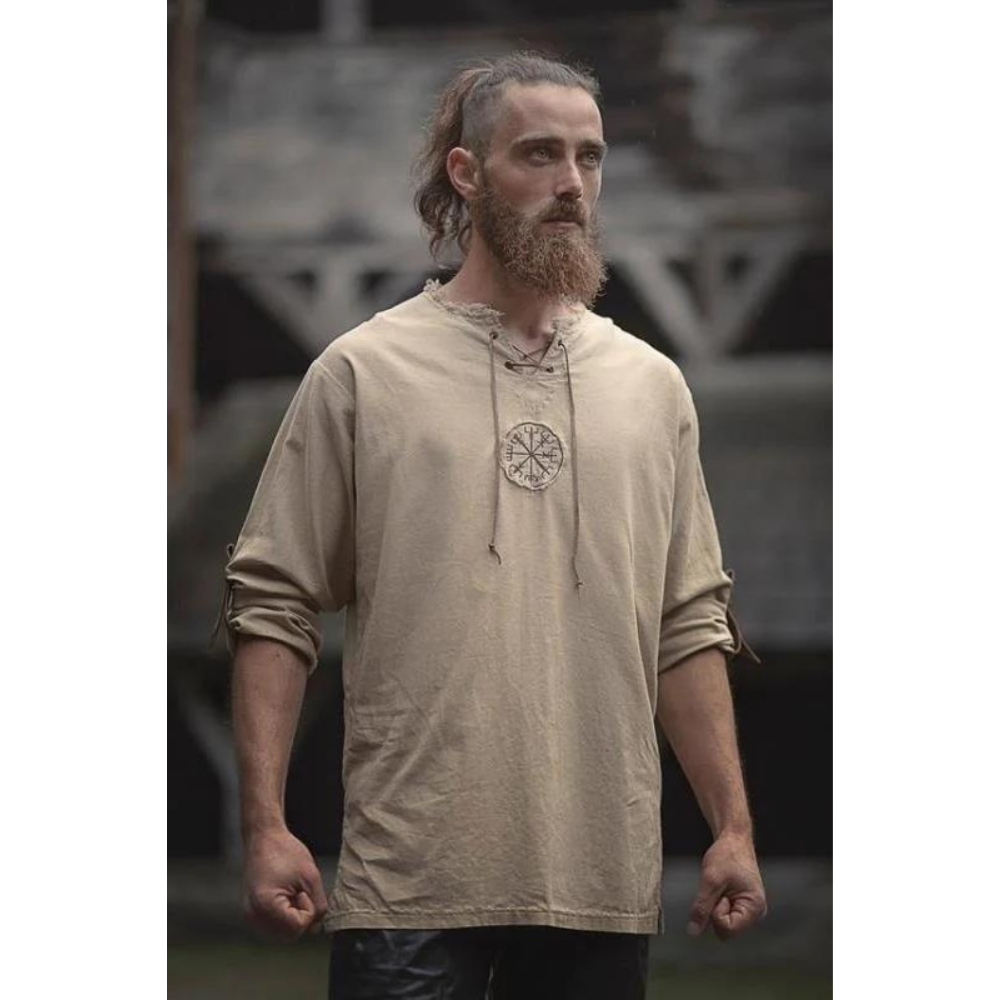 Viking wearing a beige runic Vegvisir emblem long sleeve shirt.