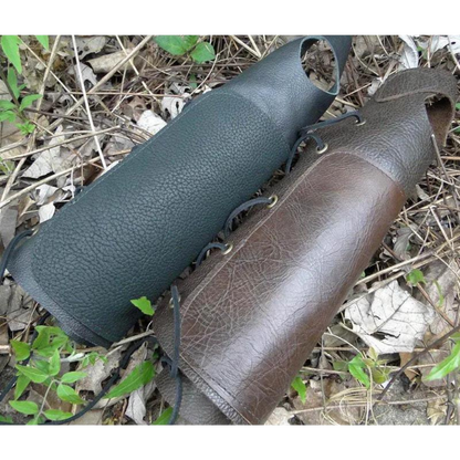 Black and brown archer's laced bracers, leather forearm armor, ideal for medieval and renaissance fair outfits.