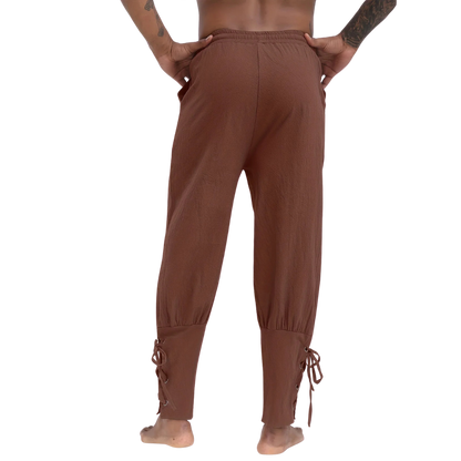 The back view of Renporium's Brown Medieval Trousers, great addition to any Renaissance faire outfit.